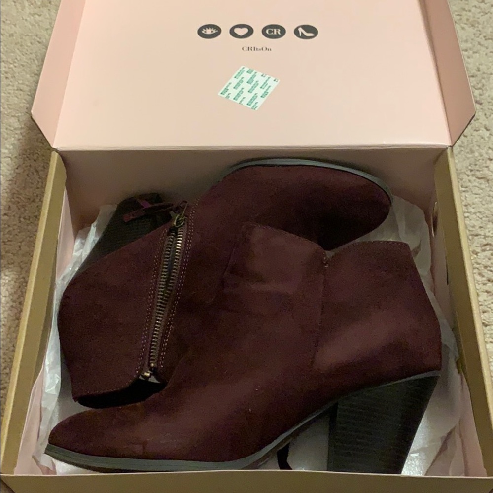 purple booties.